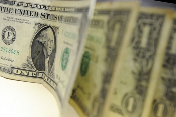 Dólar mantém viés de alta com cautela global